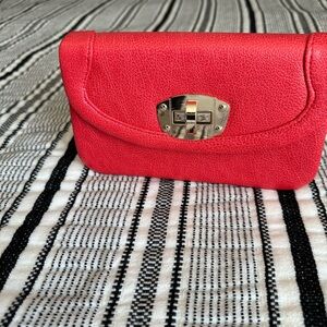 Red orange purse with clasp and optional chain strap